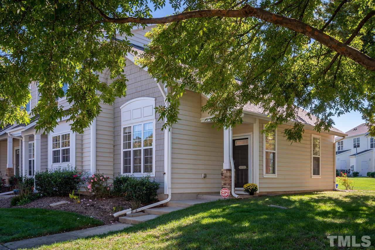 4 Cranbrook Court Durham, NC 27713 - Photo 2 of 30 a front view of a house with a yard and garage