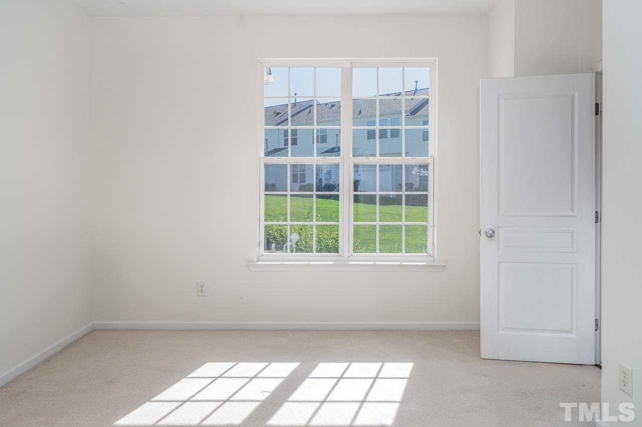 4 Cranbrook Court Durham, NC 27713 - Photo 17 of 30 a view of an empty room with a window