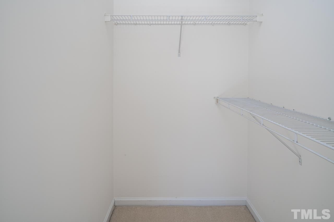4 Cranbrook Court Durham, NC 27713 - Photo 18 of 30 a view of small space with racks on the wall