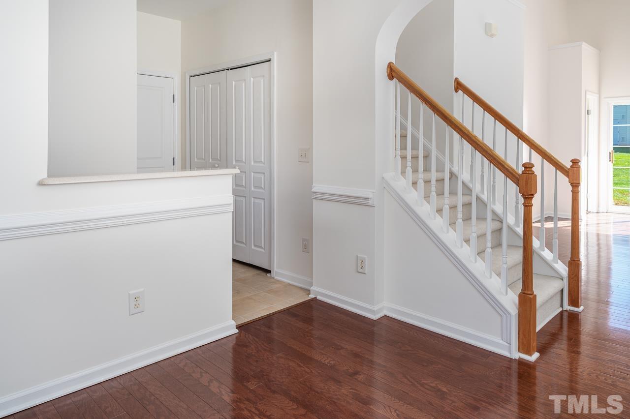 4 Cranbrook Court Durham, NC 27713 - Photo 21 of 30 a view of staircase with white walls and a window