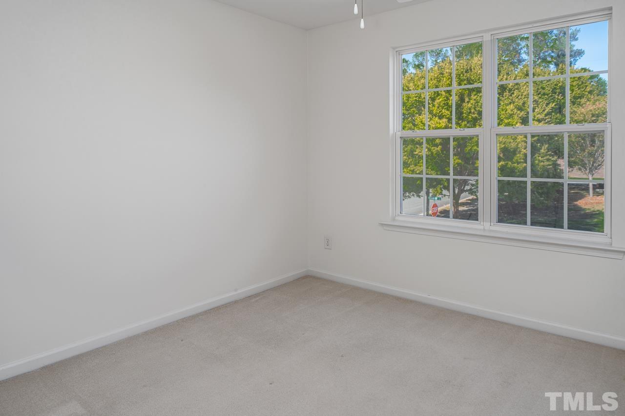 4 Cranbrook Court Durham, NC 27713 - Photo 23 of 30 an empty room with a window