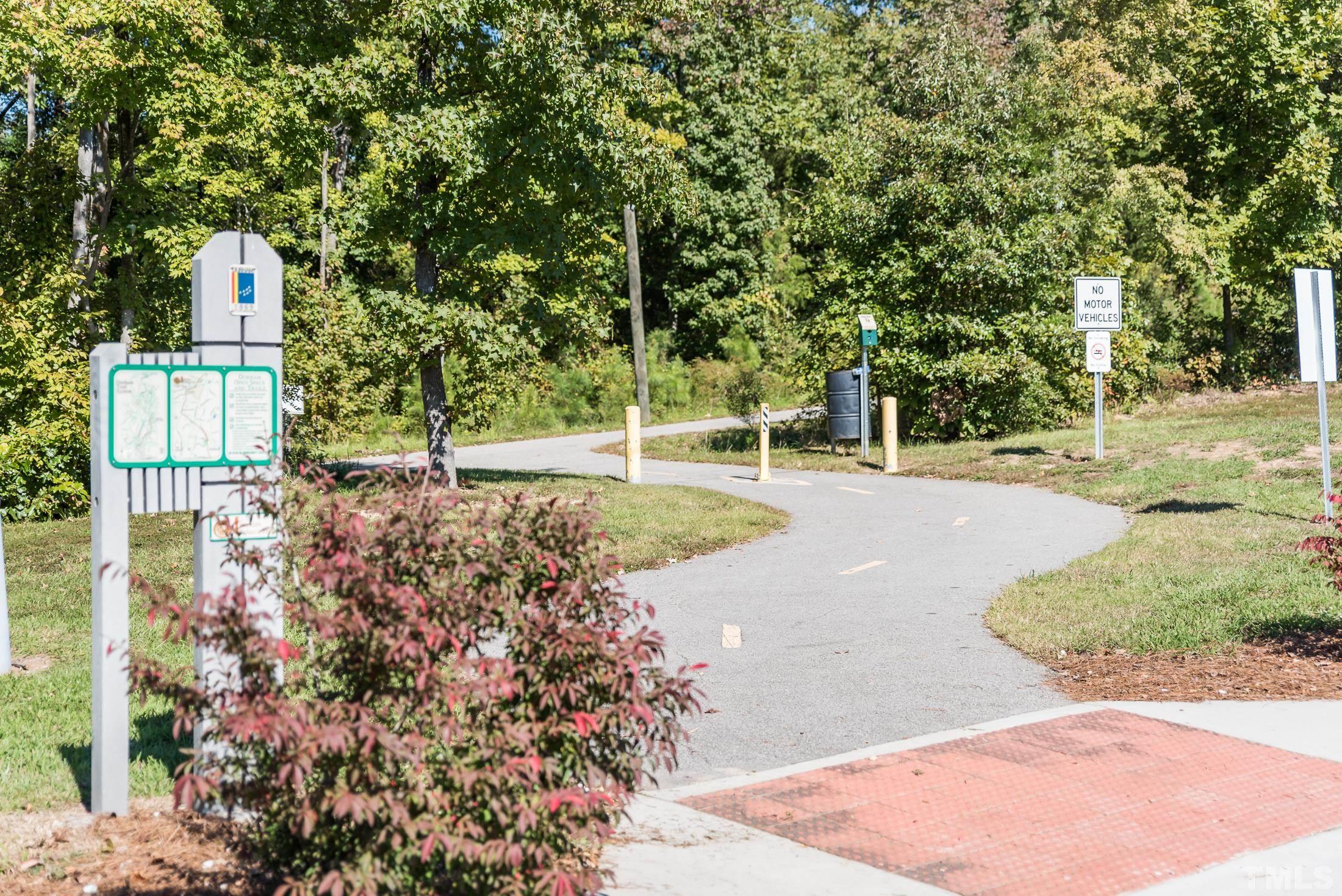 4 Cranbrook Court Durham, NC 27713 - Photo 29 of 30 a view of a park with plants and trees