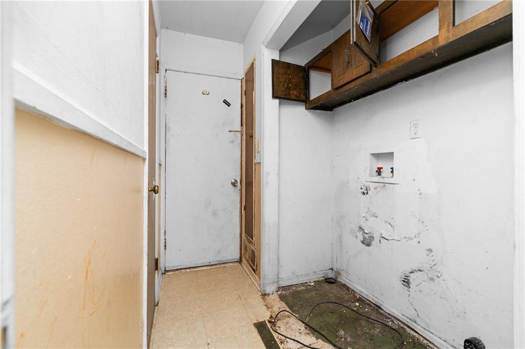 1973 Pinetree Trail Gainesville, GA 30501 - Photo 12 of 26 a bathroom with a granite countertop shower and a sink