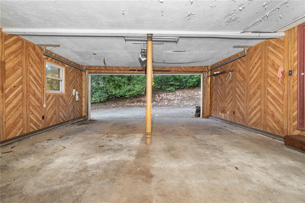 1973 Pinetree Trail Gainesville, GA 30501 - Photo 24 of 26 a view of a room with wooden walls and a window