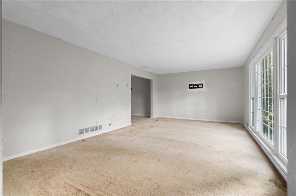 1973 Pinetree Trail Gainesville, GA 30501 - Photo 4 of 26 an empty room with windows