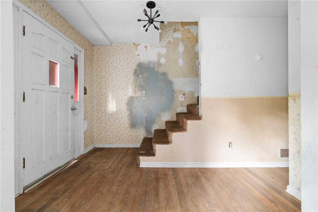 1973 Pinetree Trail Gainesville, GA 30501 - Photo 5 of 26 a view of a room with wooden floor and entryway