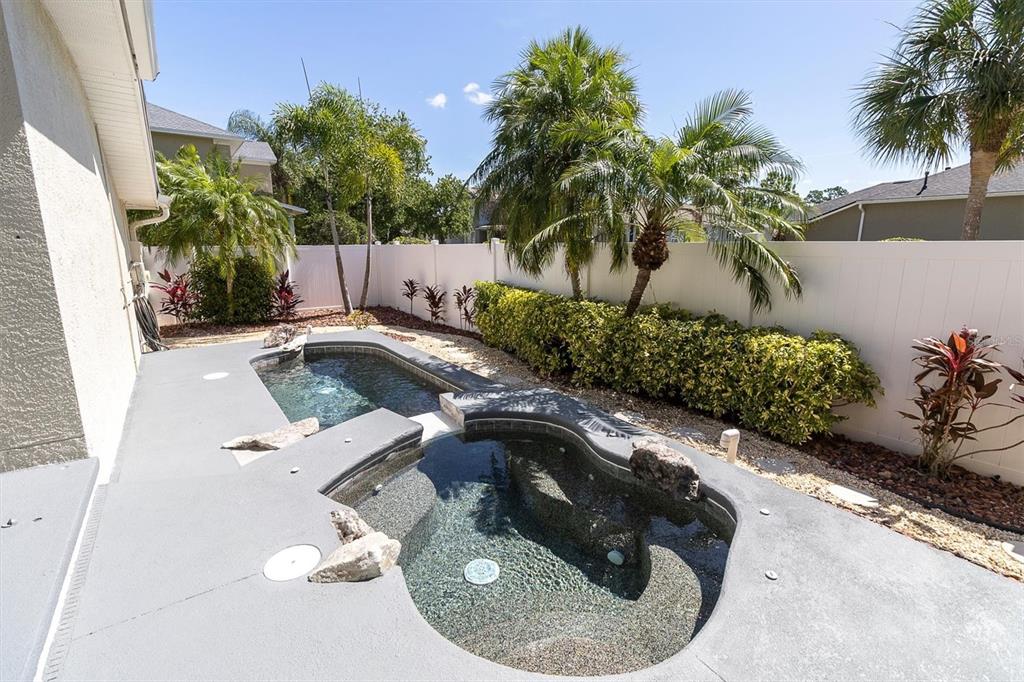 10121 Porch Street New Port Richey, FL 34655 - Photo 39 of 57 view of a couches and a fire pit in the garden