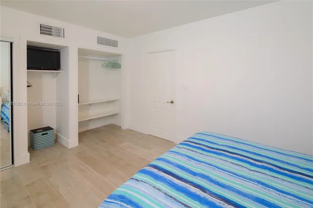 a view of room with walk in closet