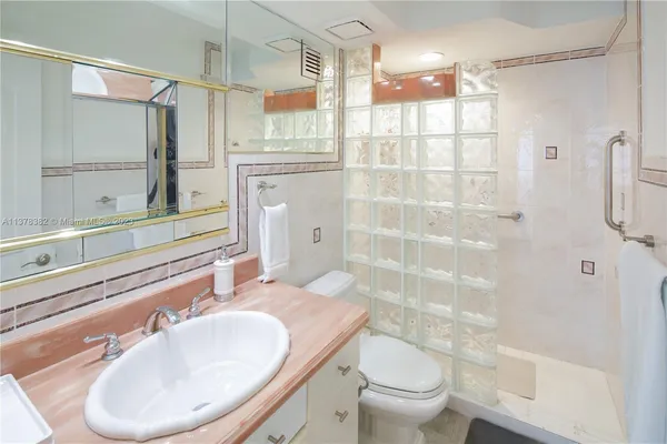 a bathroom with a bathtub and a sink