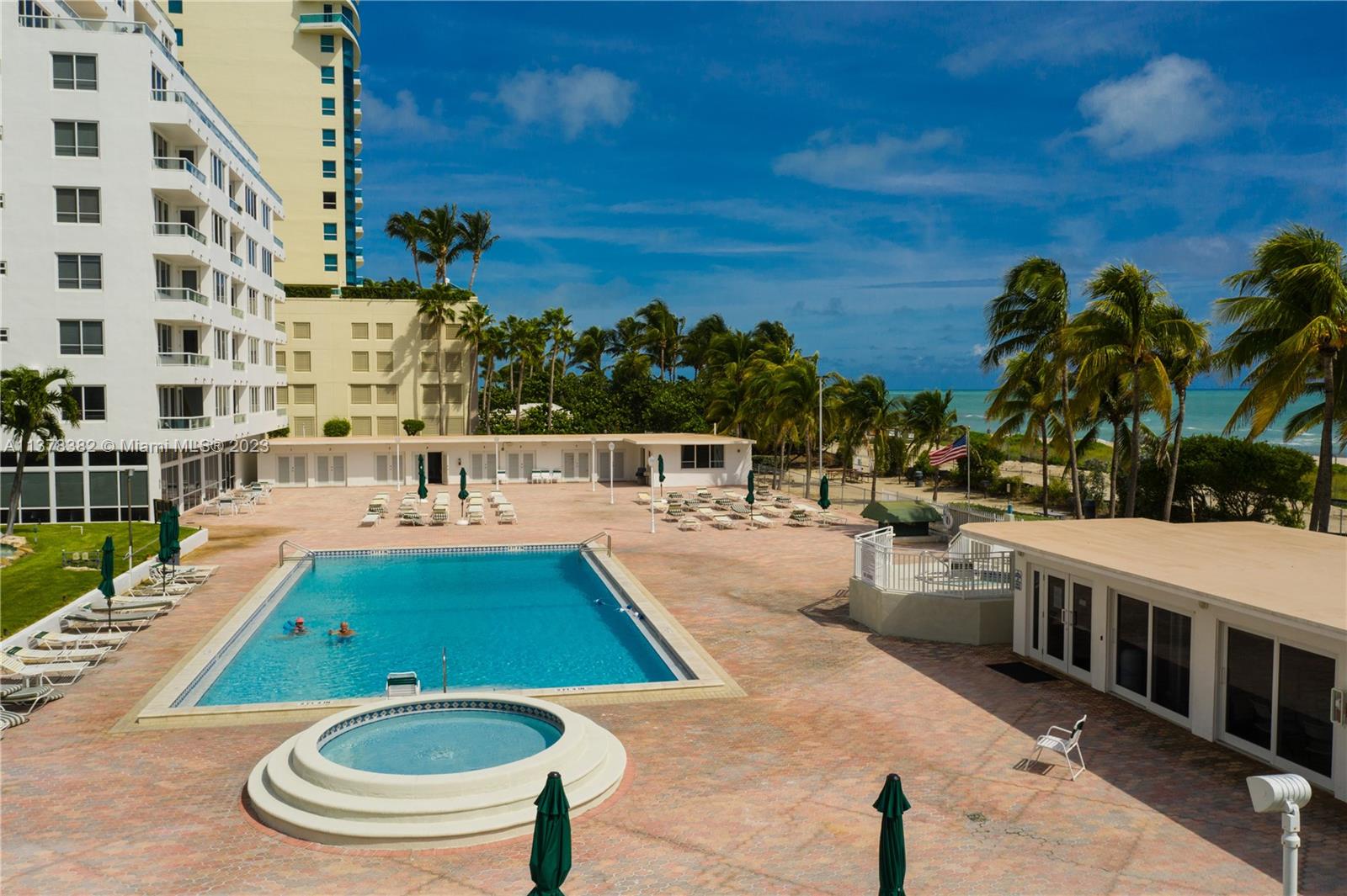 5005 Collins Avenue, Unit 610 Miami Beach, FL 33140 - Photo 25 of 31 swimming pool view with a outdoor seating space
