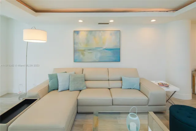 a living room with furniture and a couch