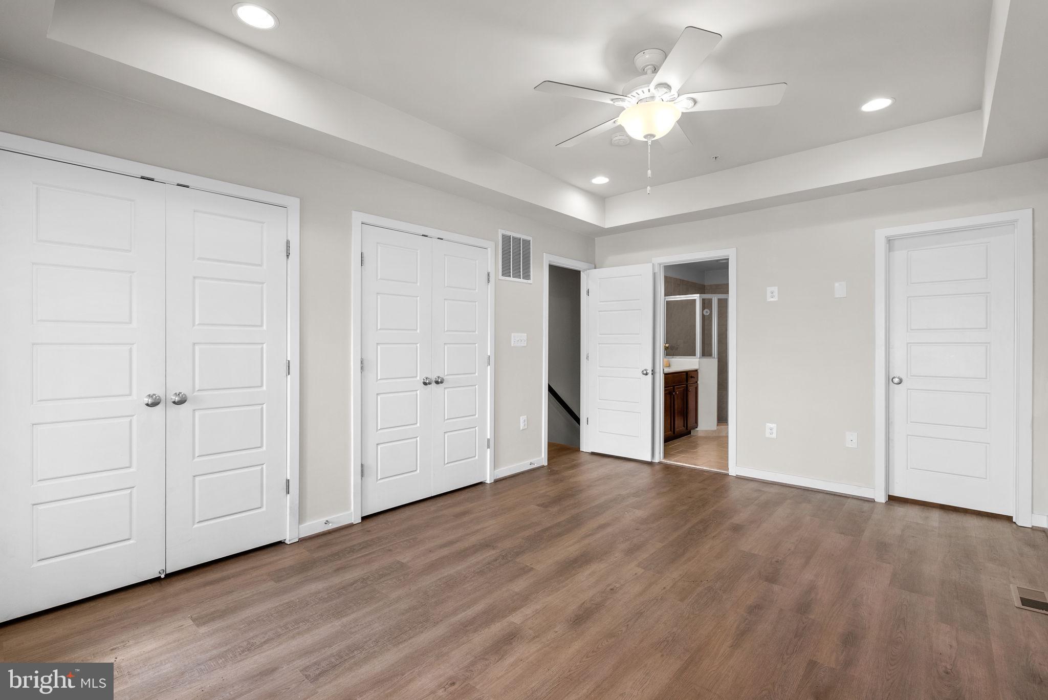 2419 Auden Drive Silver Spring, MD 20906 - Photo 20 of 40 a view of an empty room with wooden floor