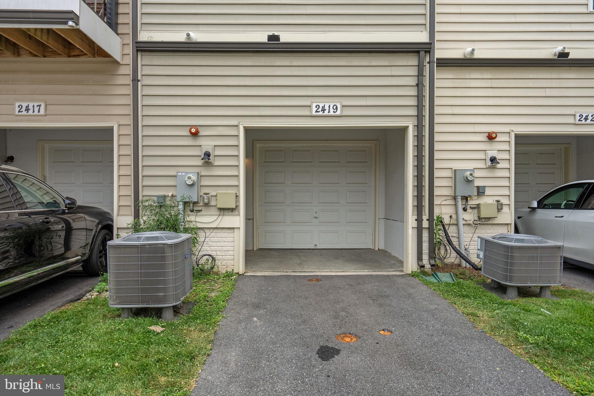 2419 Auden Drive Silver Spring, MD 20906 - Photo 38 of 40 a view of a house with backyard sitting area and garden