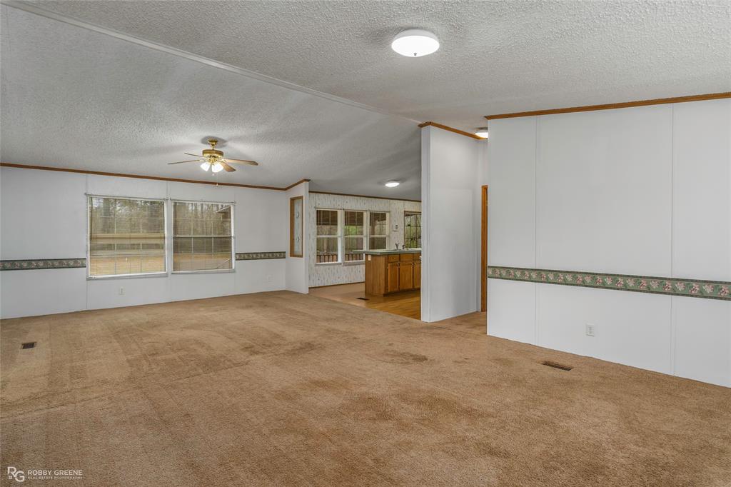 1230 Chipper Lane Keithville, LA 71047 - Photo 11 of 27 a view of an empty room with a window