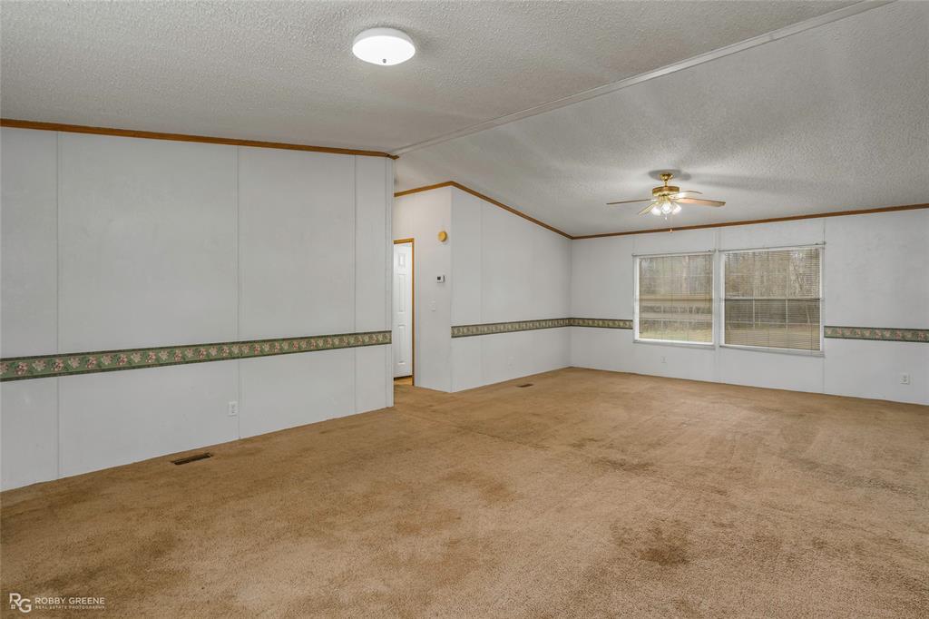 1230 Chipper Lane Keithville, LA 71047 - Photo 12 of 27 a view of an empty room with a window