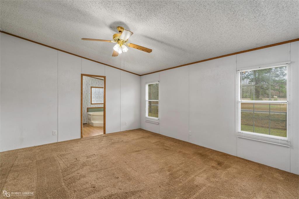1230 Chipper Lane Keithville, LA 71047 - Photo 20 of 27 a view of an empty room with a window