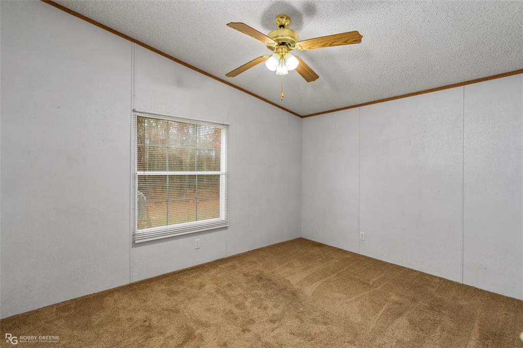 1230 Chipper Lane Keithville, LA 71047 - Photo 25 of 27 an empty room with a window