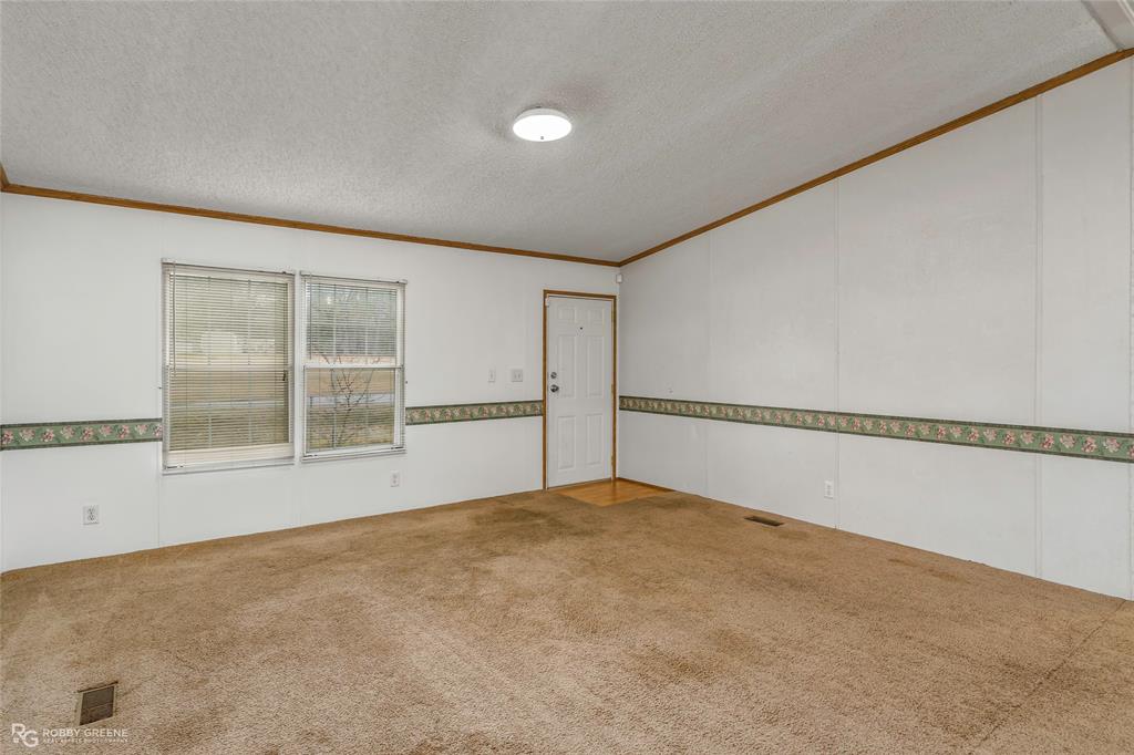 1230 Chipper Lane Keithville, LA 71047 - Photo 9 of 27 a view of an empty room with a window