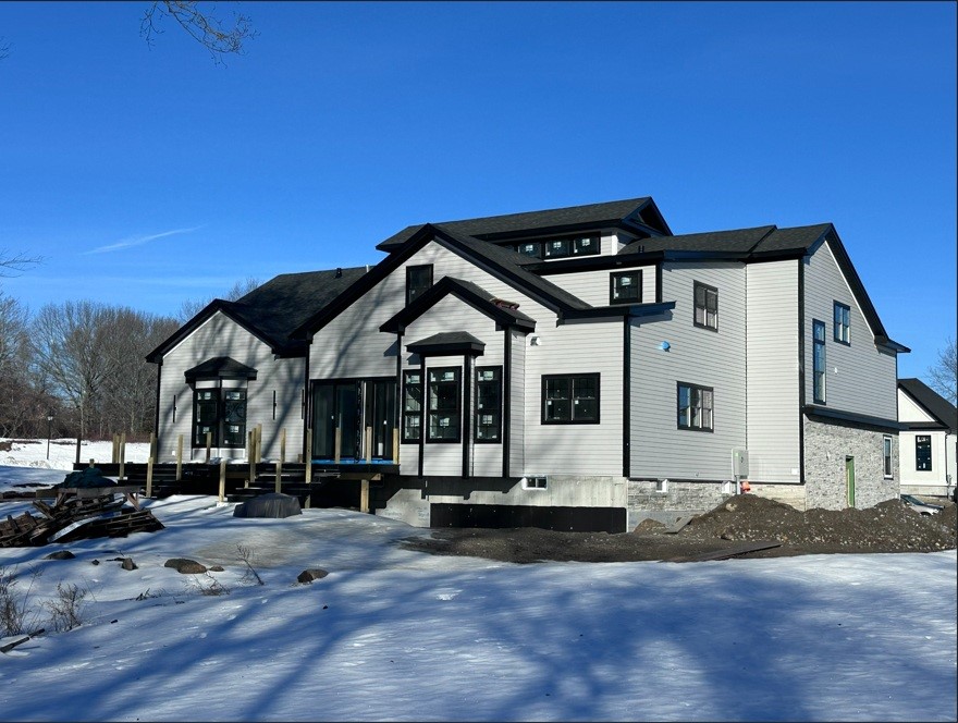New construction in Fairgrounds Estates / Kendall Estates by Vitay Cubstom Homes features over 5,700 square feet of living space. Home is currently under construction.