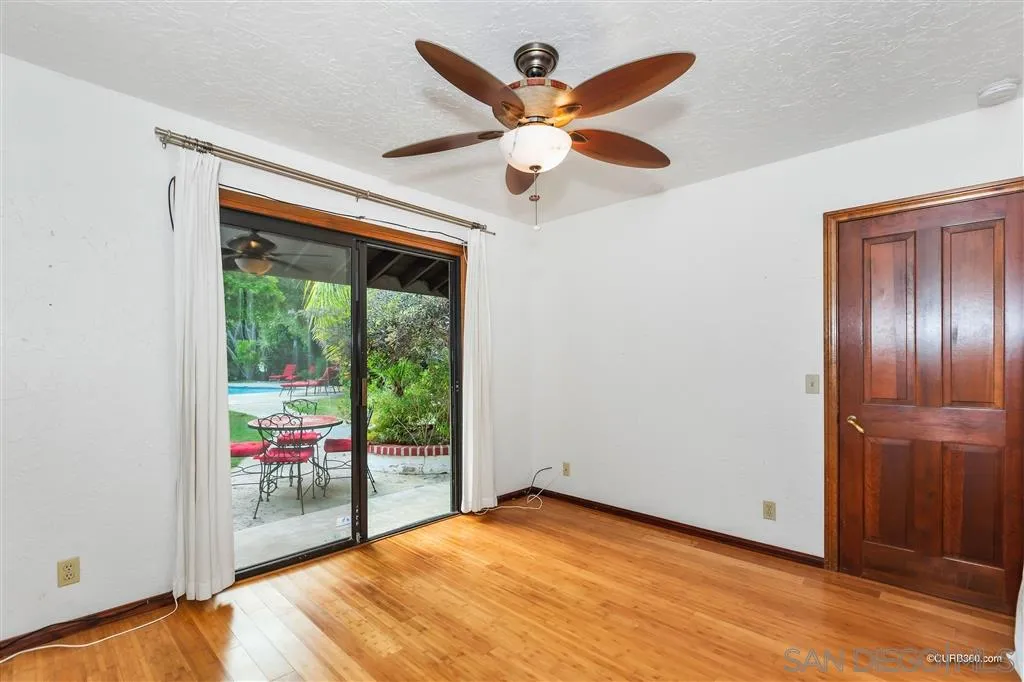 1156 Wild Canary Lane Encinitas, CA 92024 - Photo 20 of 20 a view of an empty room with a window