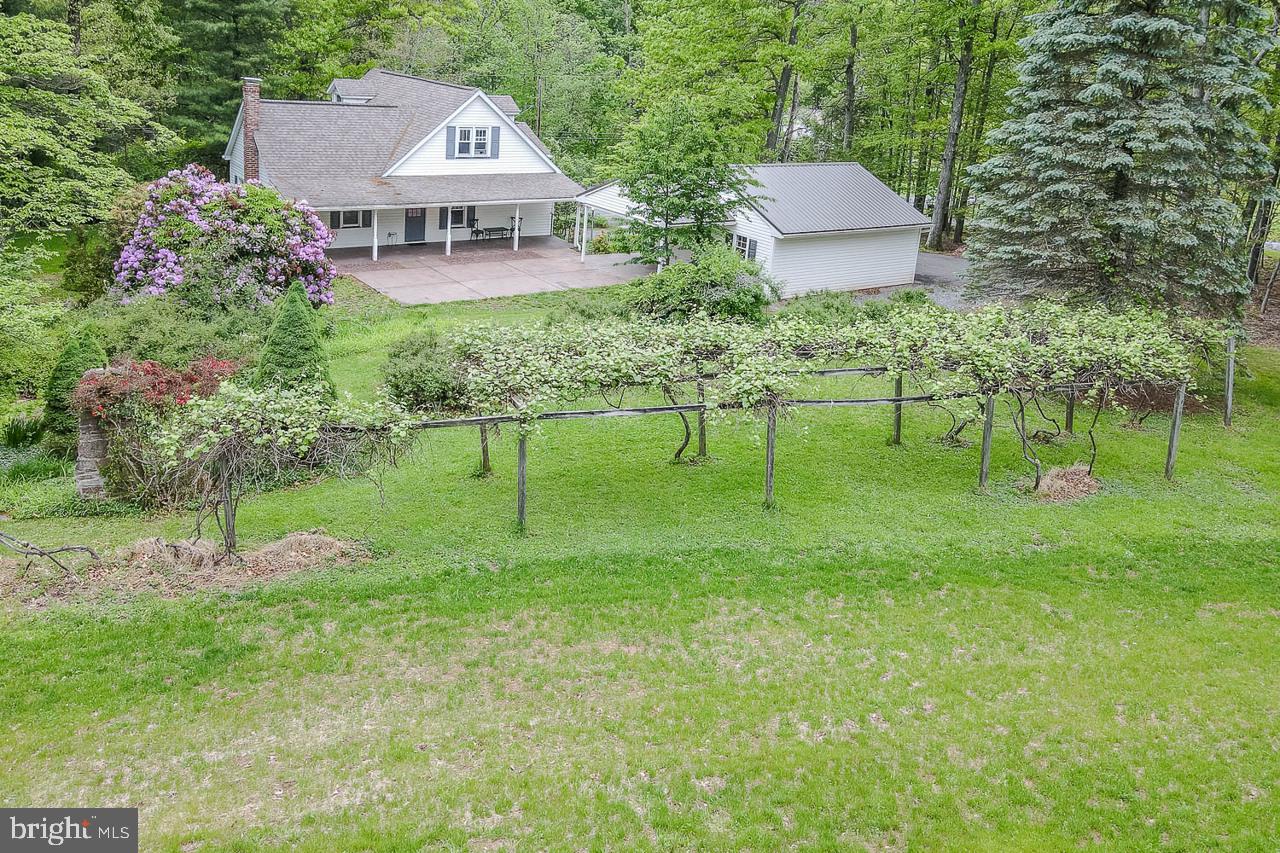 1834 Decker Hollow Road Tyrone, PA 16686 - Photo 2 of 40 a view of a table and chairs in the garden