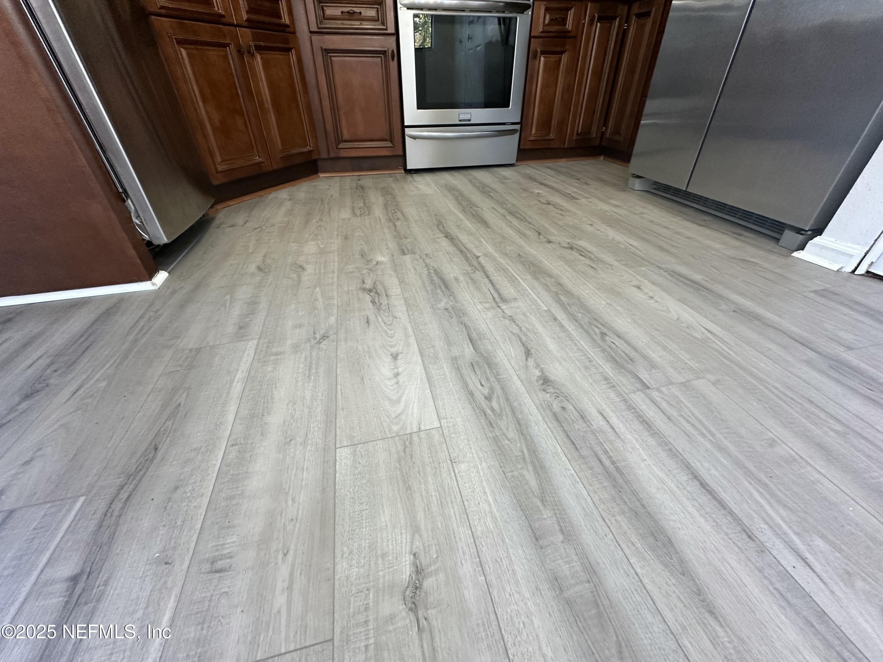 3801 Crown Point Road, Unit 3082 Jacksonville, FL 32257 - Photo 16 of 41 a view of wooden floor with entryway