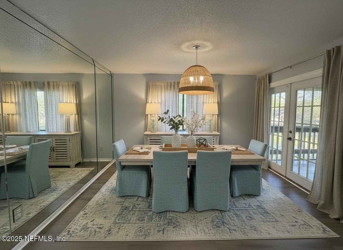 3801 Crown Point Road, Unit 3082 Jacksonville, FL 32257 - Photo 18 of 41 a view of a dining room with furniture window and wooden floor
