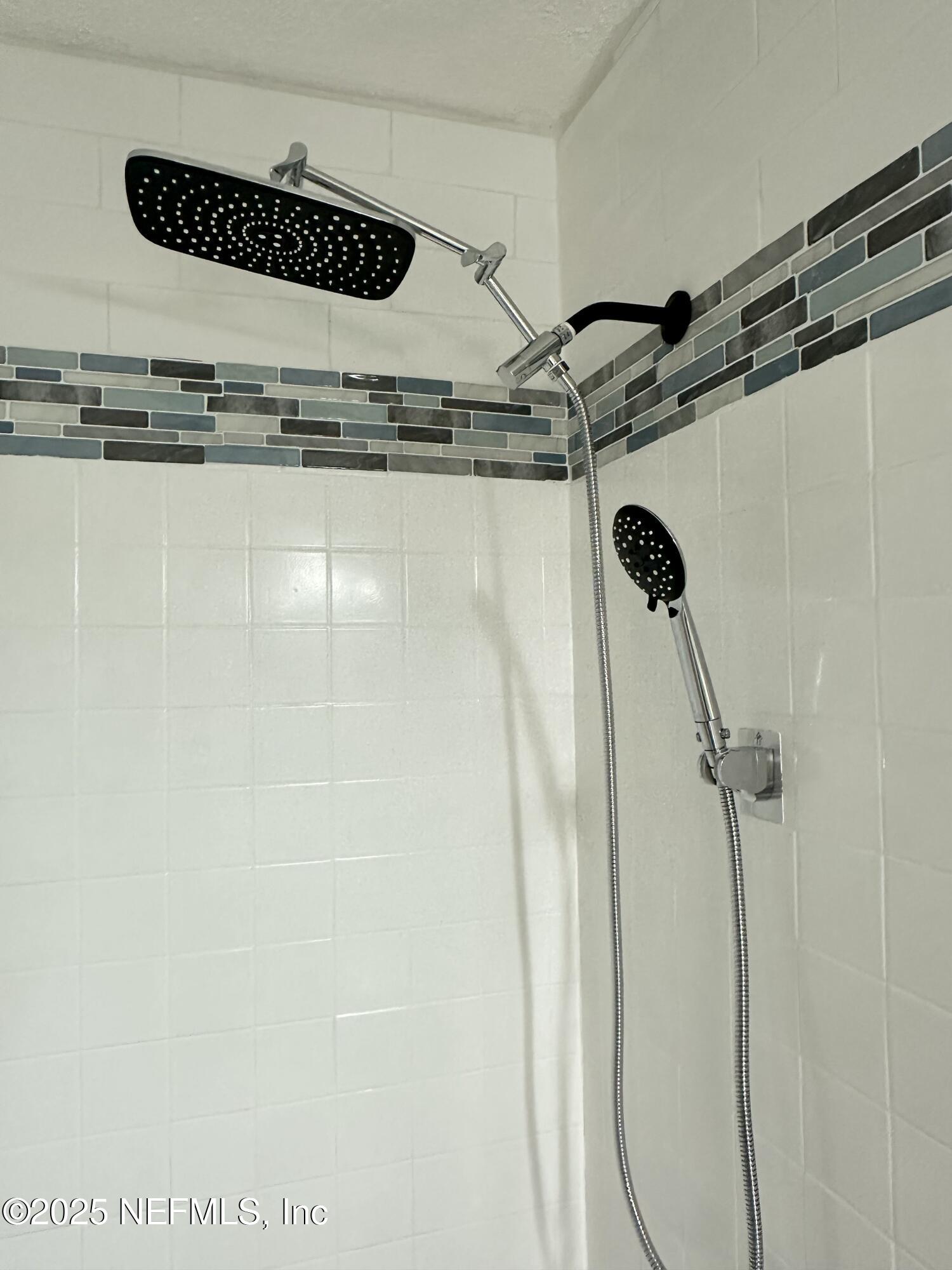 3801 Crown Point Road, Unit 3082 Jacksonville, FL 32257 - Photo 27 of 41 a close view of a shower in the bathroom