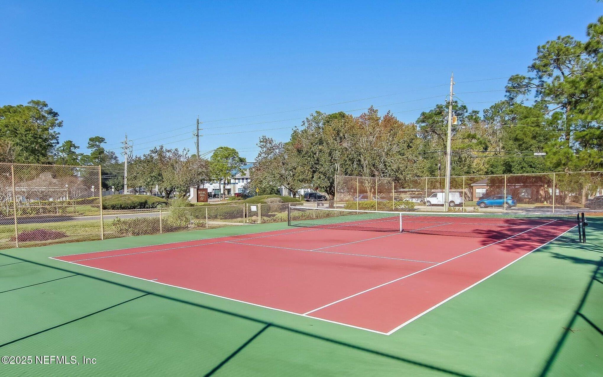 3801 Crown Point Road, Unit 3082 Jacksonville, FL 32257 - Photo 40 of 41 a view of a tennis court