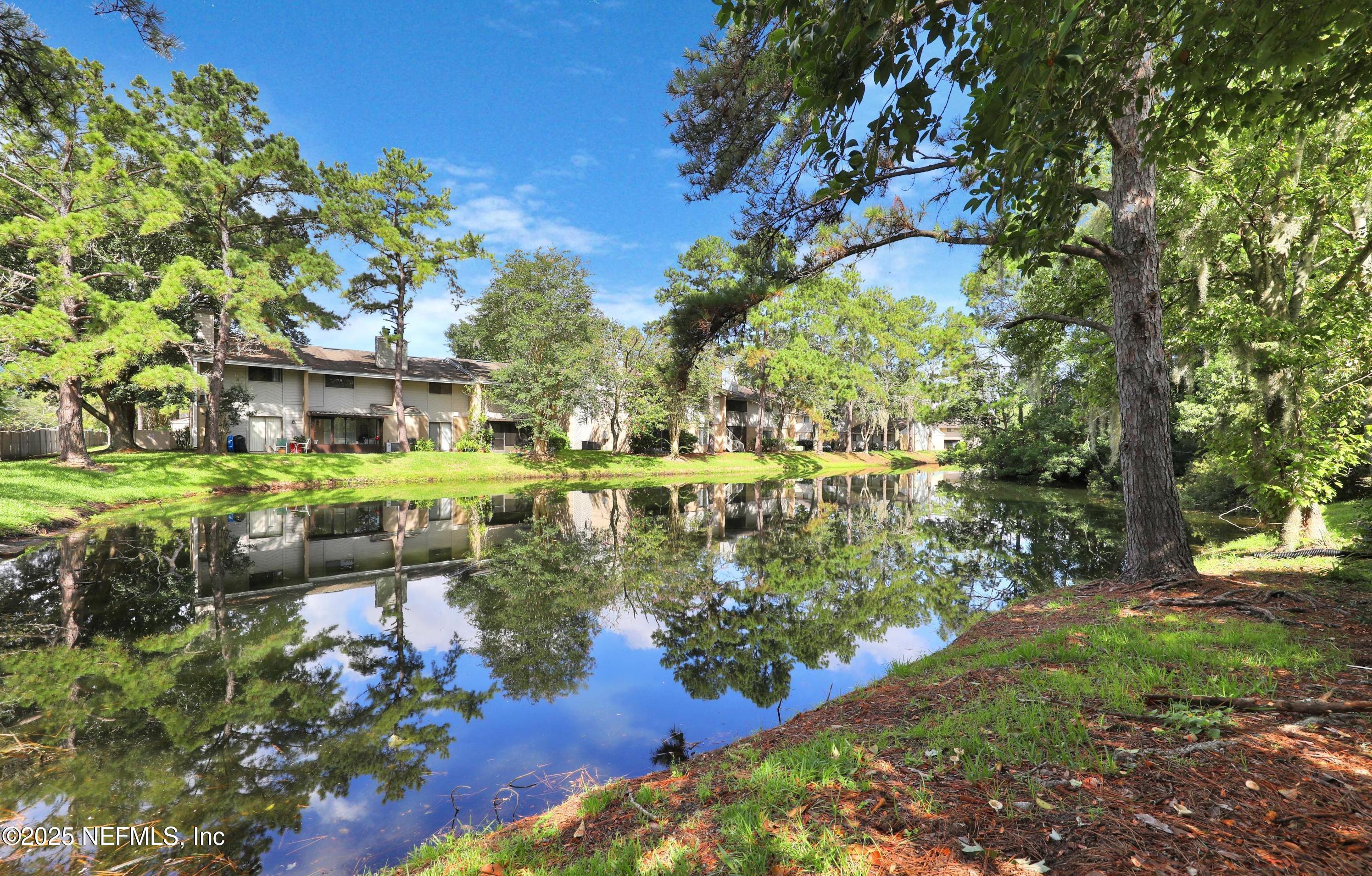 3801 Crown Point Road, Unit 3082 Jacksonville, FL 32257 - Photo 41 of 41 a view of a lake with houses