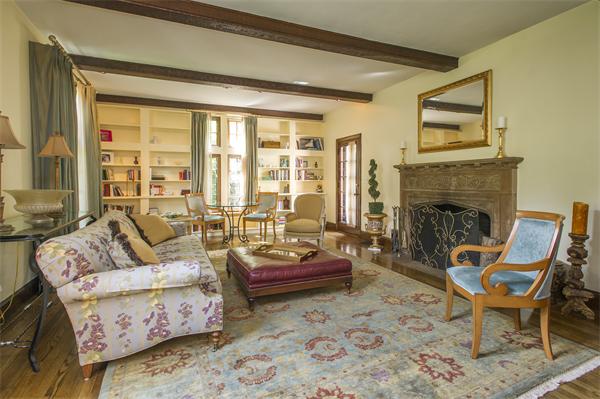 15 Wykeham Road Newton, MA 02465 - Photo 8 of 10 a living room with furniture and a fireplace