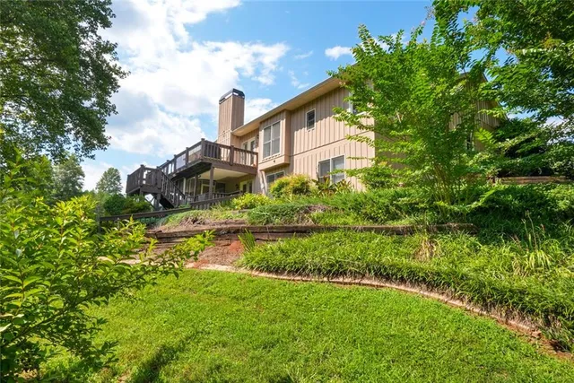a view of a garden with a building
