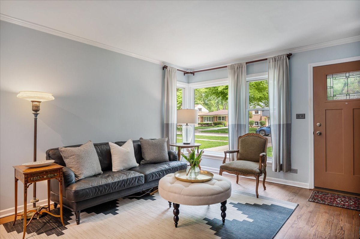 630 Long Road Glenview, IL 60025 - Photo 2 of 24 a living room with furniture and a large window
