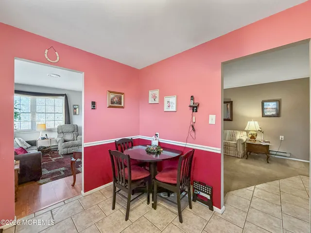a view of a dining room with furniture