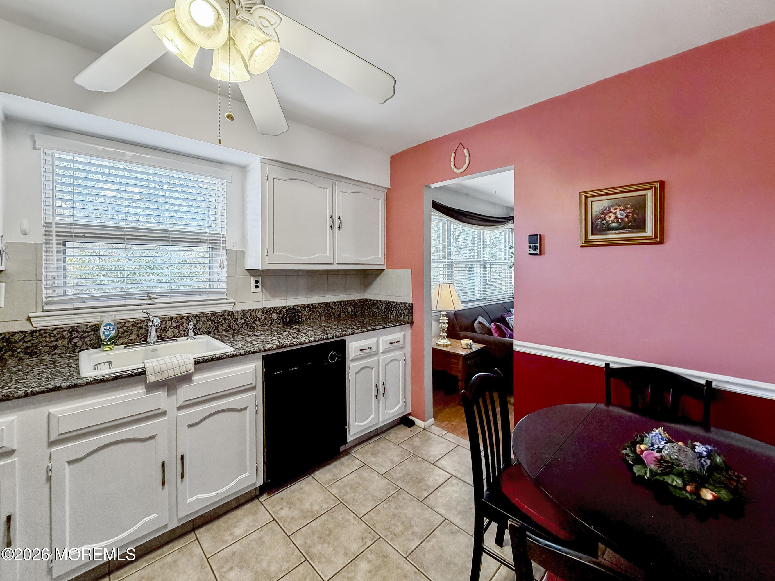 23 Higgins Court Brick, NJ 08724 - Photo 28 of 28 a kitchen with a refrigerator sink and cabinets