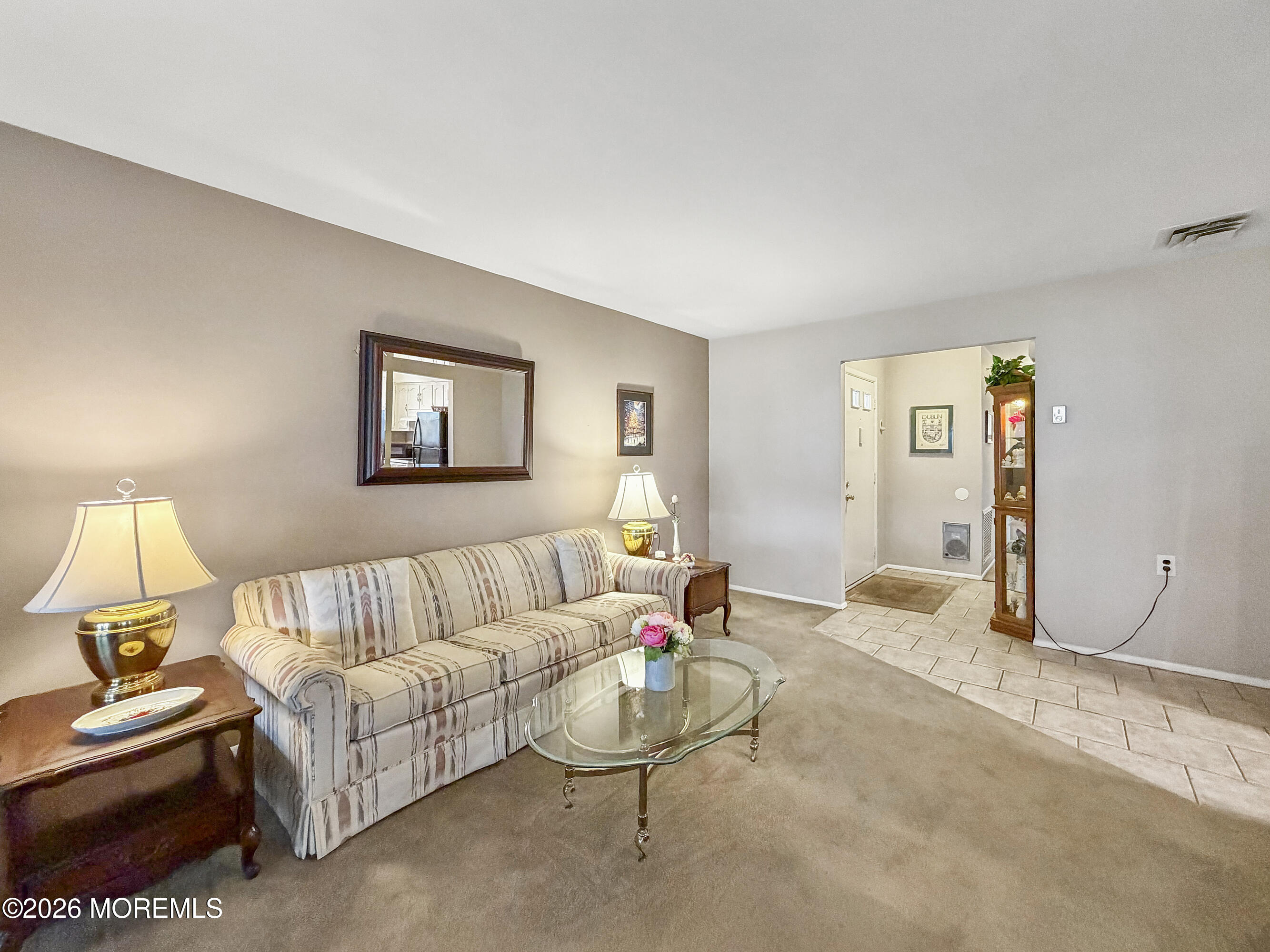 23 Higgins Court Brick, NJ 08724 - Photo 4 of 28 a living room with furniture and a couch