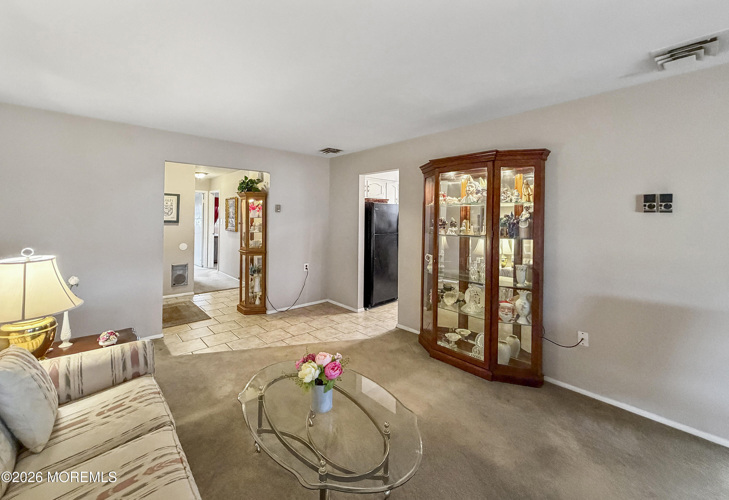 23 Higgins Court Brick, NJ 08724 - Photo 5 of 28 a living room with furniture and a window