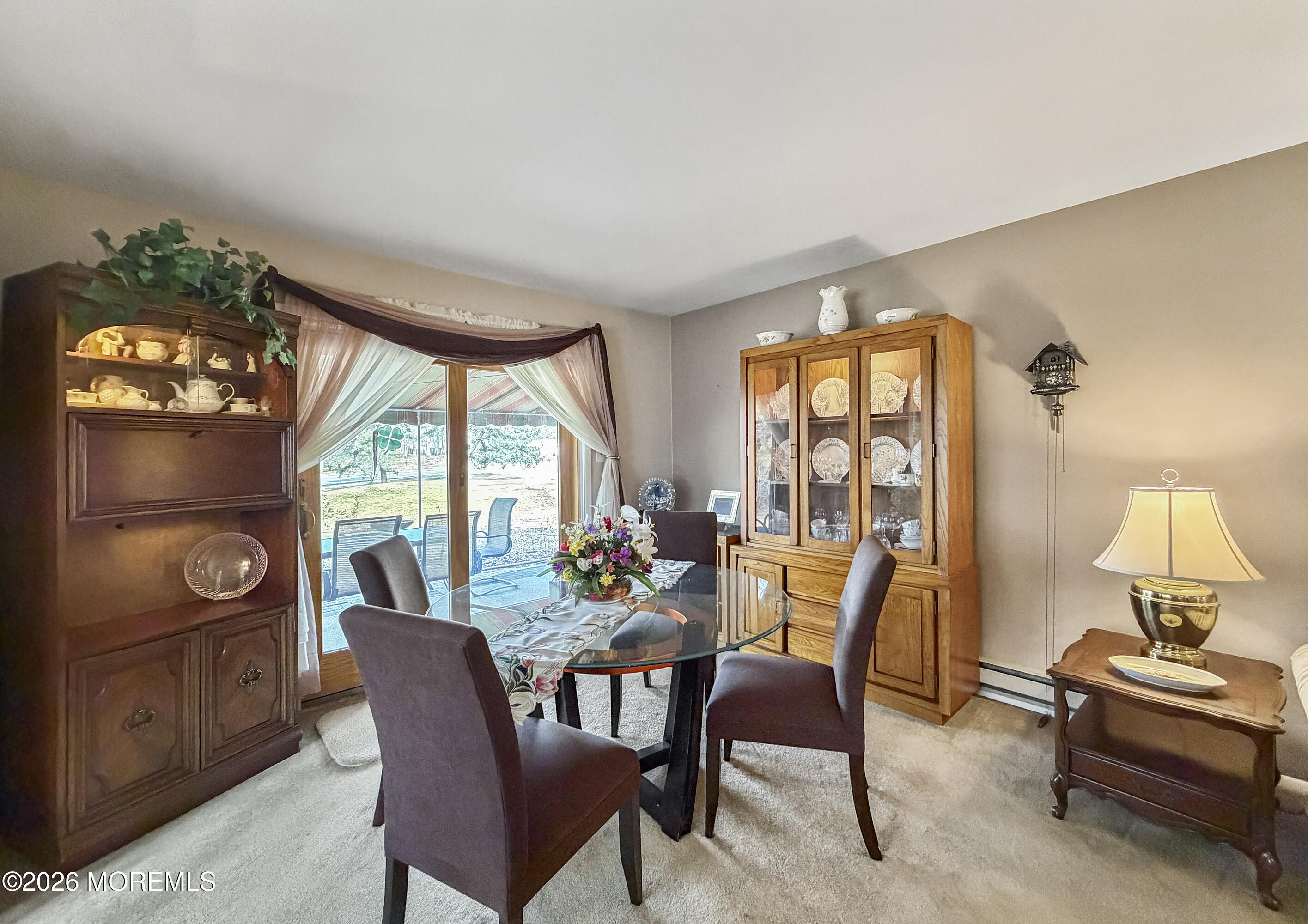 23 Higgins Court Brick, NJ 08724 - Photo 8 of 28 a view of a dining room with furniture window and outside view
