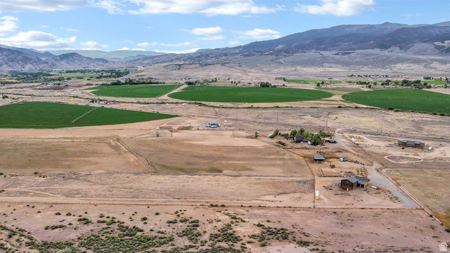 544 East 600 North, Unit 1 Joseph, UT 84739 - Photo 58 of 65 Expansive rural landscape featuring distant mountain ranges and scattered agricultural fields