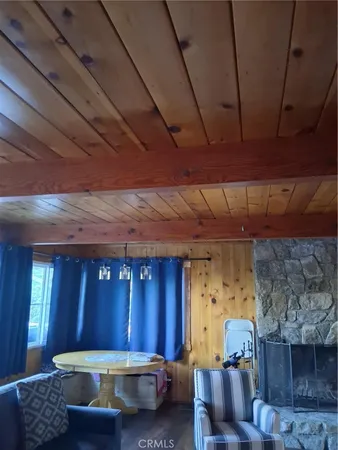 a room with furniture and a fireplace