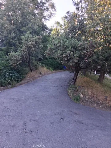a view of a backyard of a house