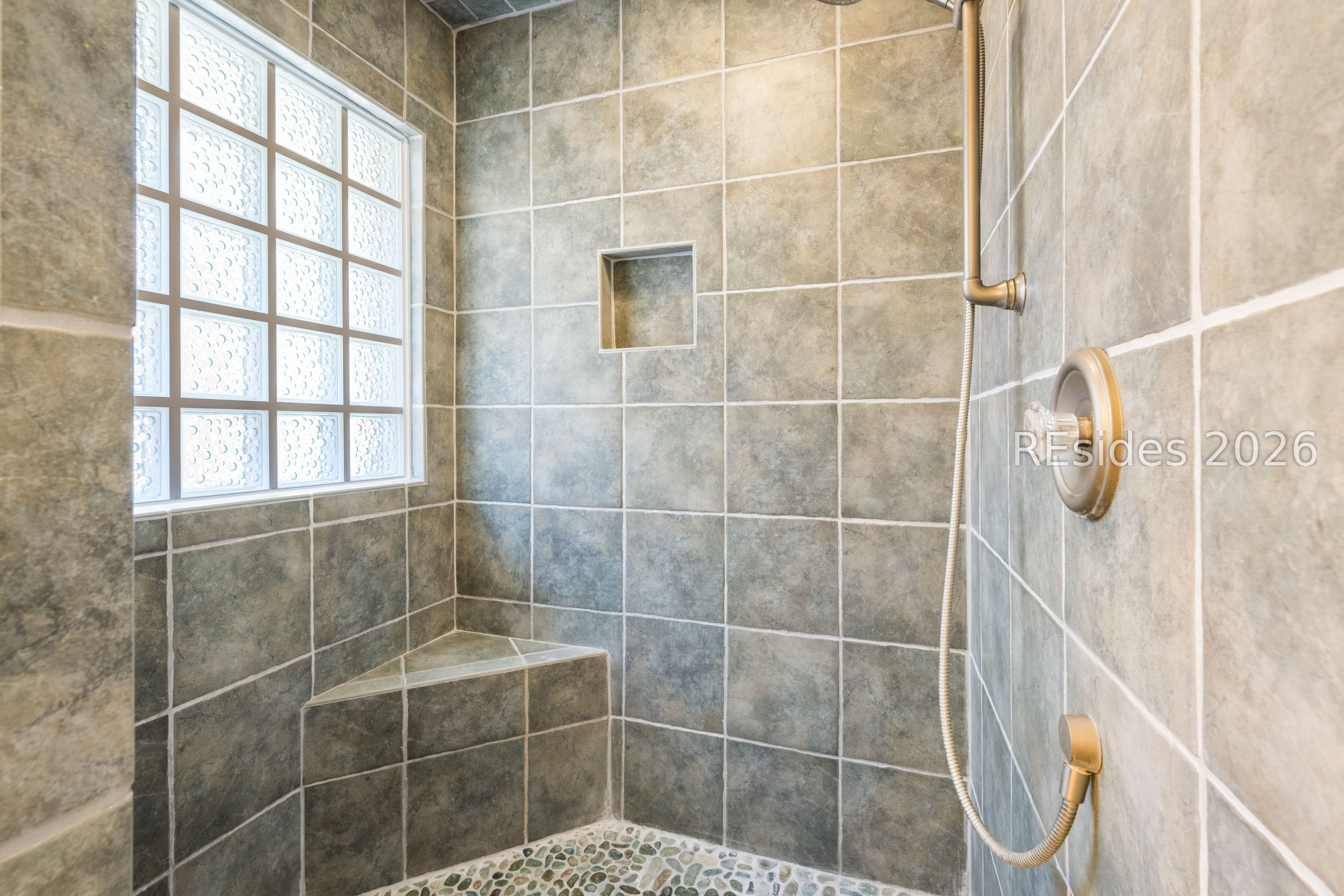 2 Night Hawk Street Hilton Head Island, SC 29928 - Photo 32 of 56 Tiled walk-in shower with privacy window for light