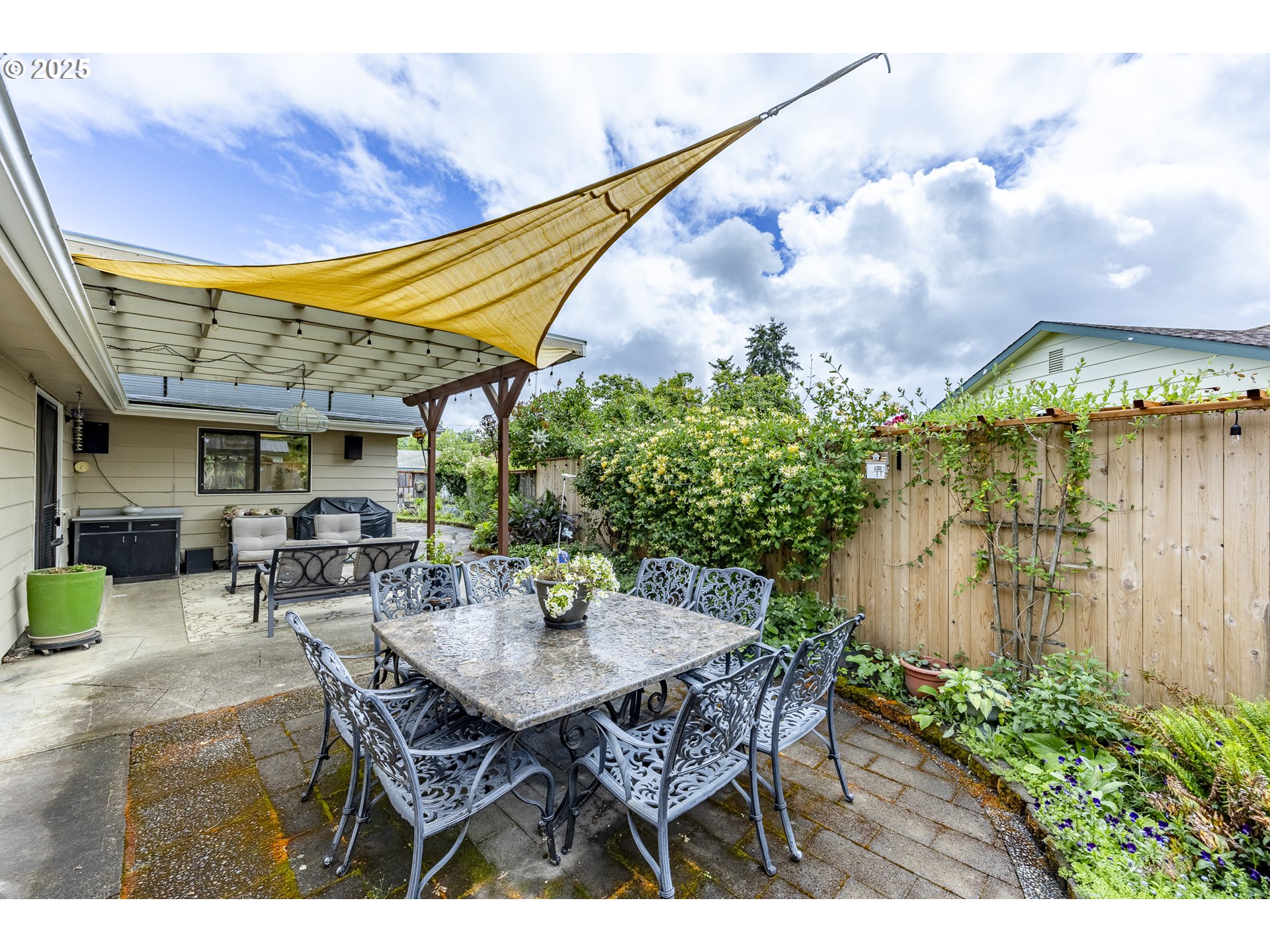 2526 34th Street Springfield, OR 97477 - Photo 46 of 47 a view of an outdoor space with a table and chairs