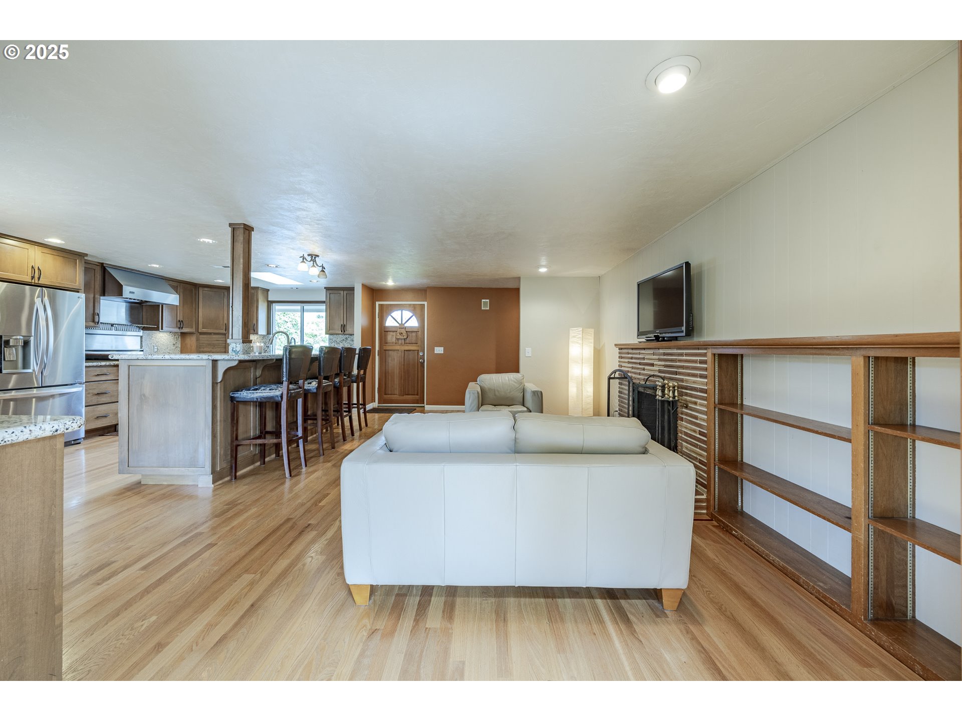 2526 34th Street Springfield, OR 97477 - Photo 9 of 47 a living room with furniture and a wooden floor