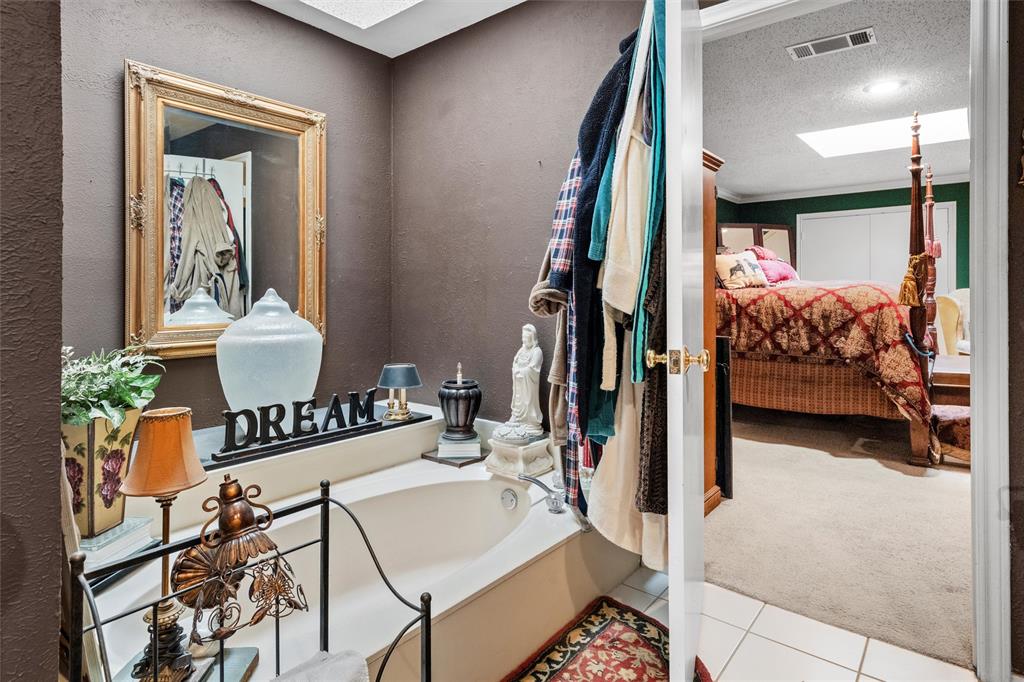 2000 Shadow Ridge Drive Arlington, TX 76006 - Photo 17 of 23 a view of living room filled with furniture and a potted plant
