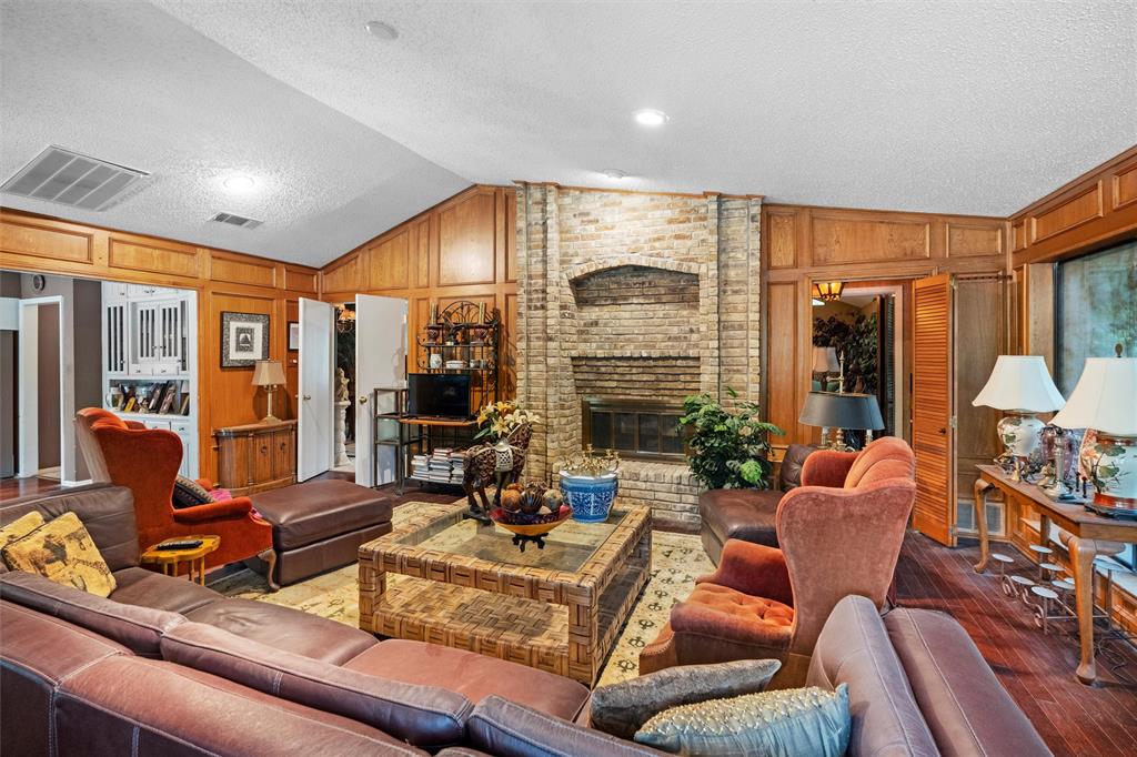 2000 Shadow Ridge Drive Arlington, TX 76006 - Photo 3 of 23 a living room with furniture fireplace and large windows