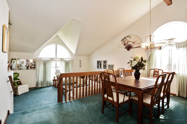 334 Highland Road Matteson, IL 60443 - Photo 3 of 10 a view of a dining room with furniture and a chandelier
