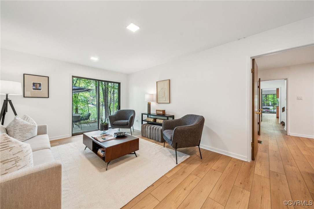 4460 Cheyenne Road Richmond, VA 23235 - Photo 11 of 47 Living room featuring light wood-type flooring and