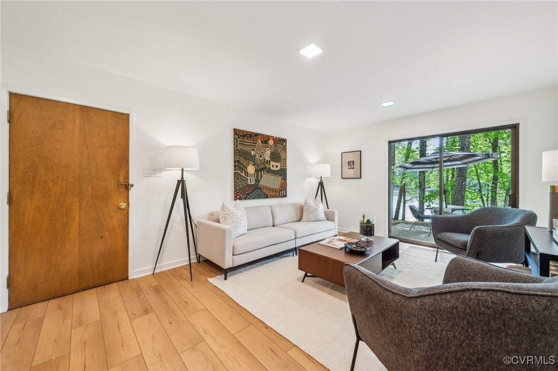 4460 Cheyenne Road Richmond, VA 23235 - Photo 12 of 47 Living room featuring light wood-style flooring
