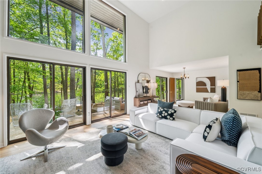 4460 Cheyenne Road Richmond, VA 23235 - Photo 15 of 47 Living area with high vaulted ceiling, a notable c